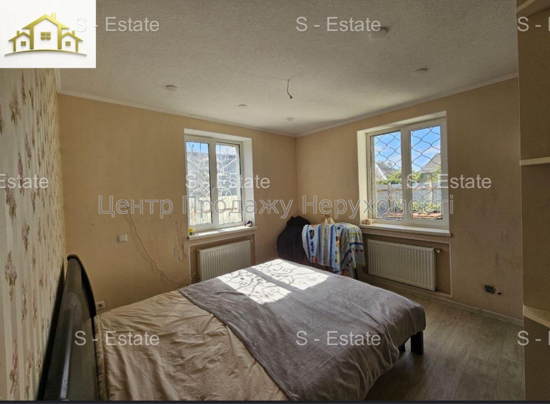 Фото Охайний будинкок в прилеглому до центру районі К89