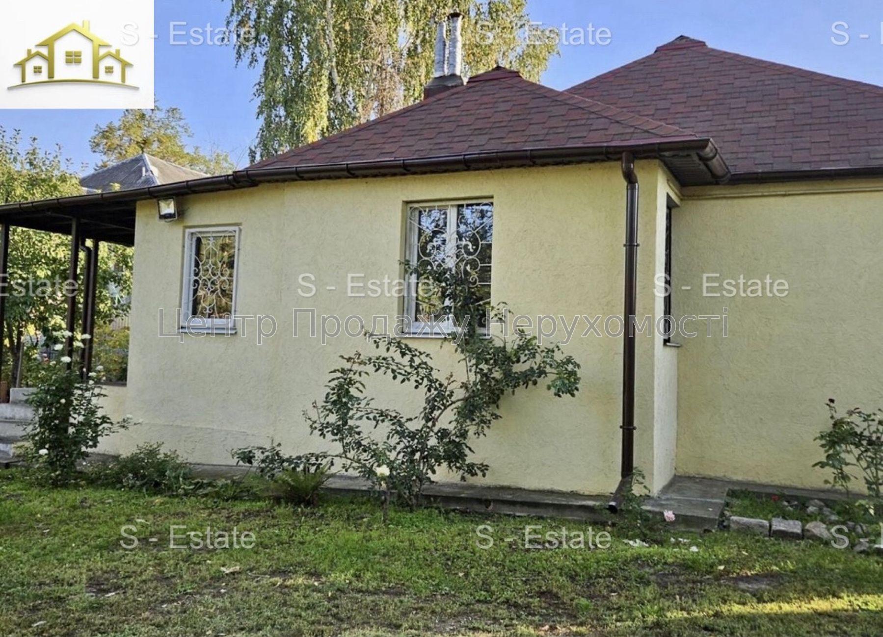 Фото Охайний будинкок в прилеглому до центру районі К82