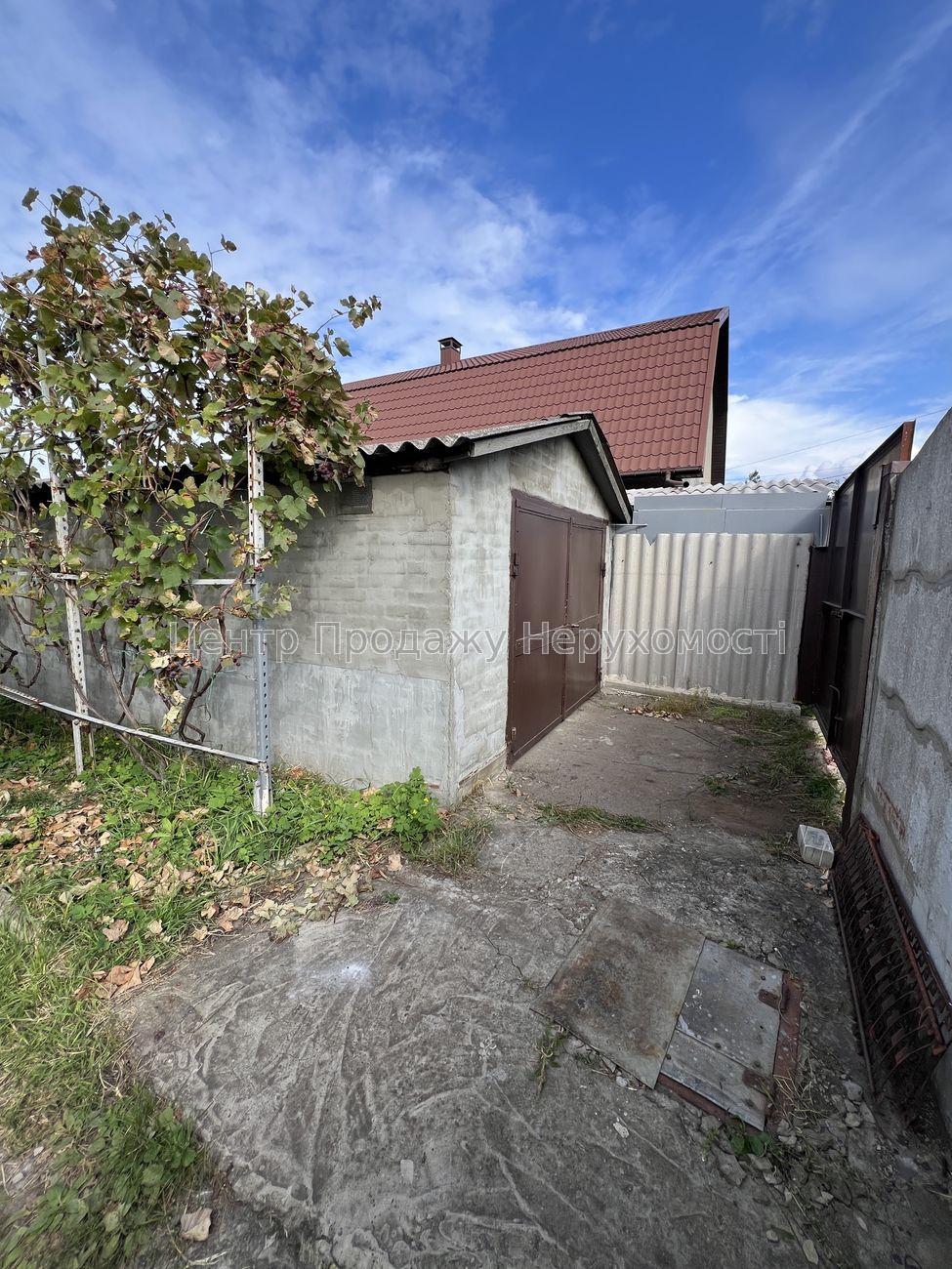 Фото Затишний будинок зі зручним розташуванням та облаштованим подвір'ям3