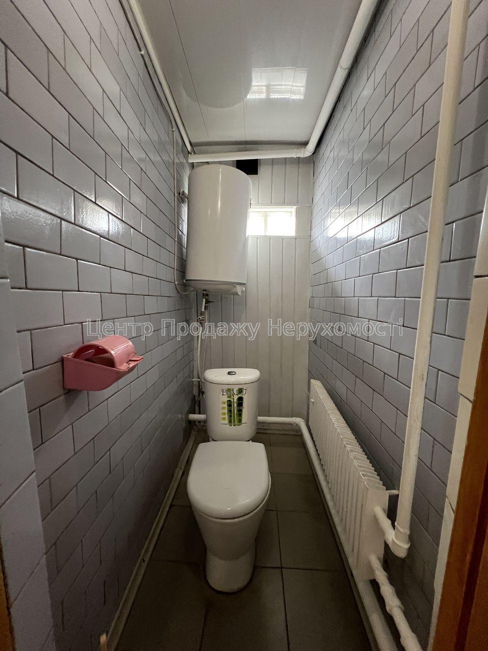 Фото Затишний будинок зі зручним розташуванням та облаштованим подвір'ям15