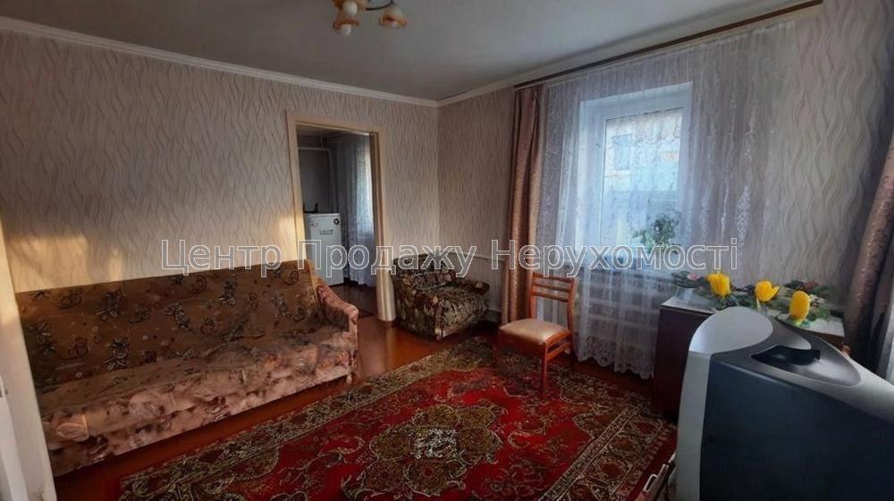 Фото Затишний будинок зі зручностями та молодим садом3