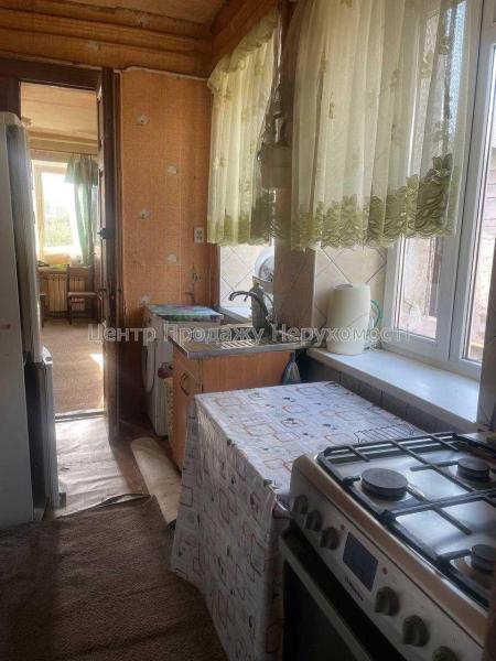 Продам 4-кімнатну квартиру