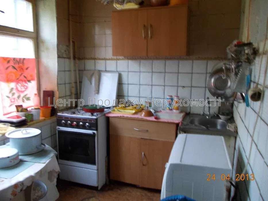 Фото Продаємо кімнату 10 м.кв. в трикімнатній квартирі.Метро ГОЛОСІЇВСЬКА7