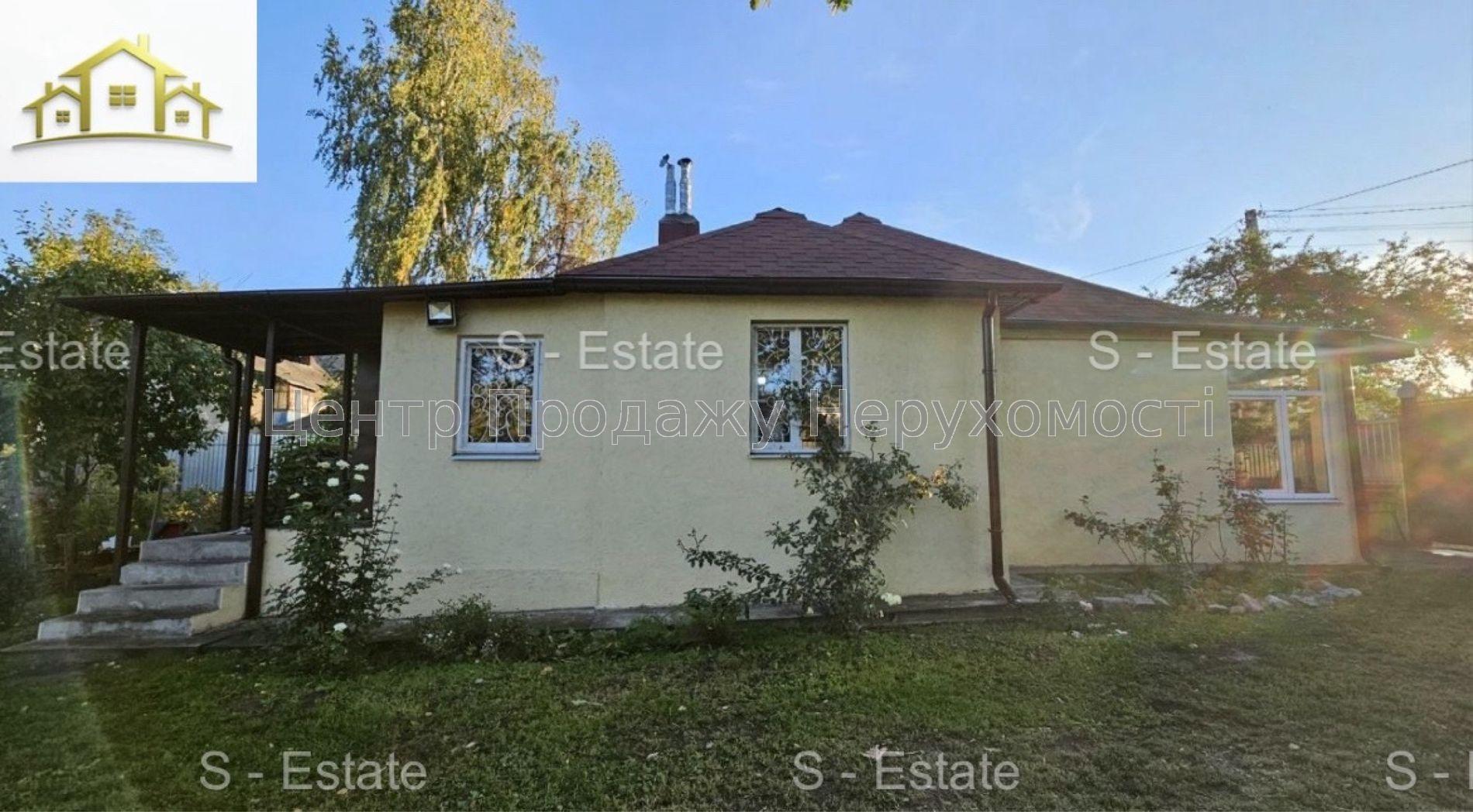 Фото Охайний будинкок в прилеглому до центру районі К813