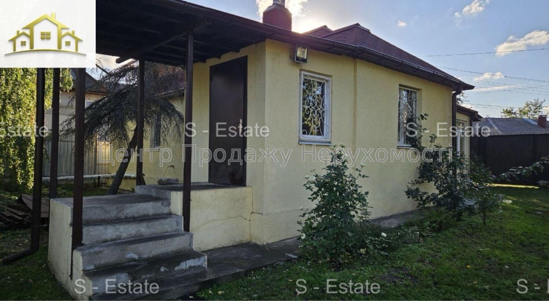 Фото Охайний будинкок в прилеглому до центру районі К84
